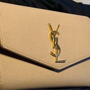 YSL wallet with detachable chains that’s the color beige , w. Leather material